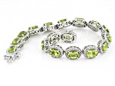 Pre-Owned Green Peridot With White Diamond Rhodium Over Sterling Silver Bracelet 12.56ctw