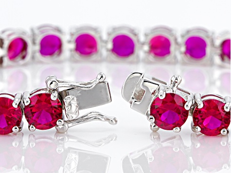 Pre-Owned Red Lab Created Ruby Rhodium Over Sterling Silver Tennis Bracelet 22.50ctw