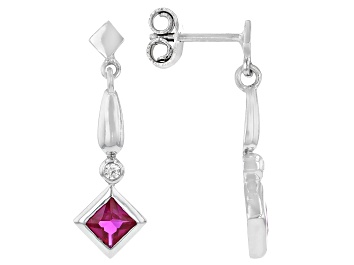 Picture of Pre-Owned Lab Created Ruby And White Cubic Zirconia Rhodium Over Sterling Silver Earrings 0.90ctw