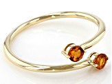 Pre-Owned Orange Madeira Citrine 10k Yellow Gold Bypass Ring .17ctw