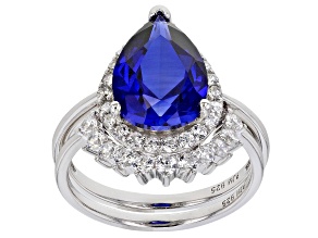 Pre-Owned Lab Created Blue Sapphire and White Cubic Zirconia Rhodium Over Sterling Ring With Band 6.