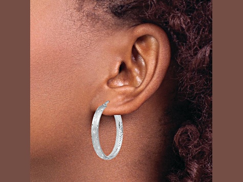 Rhodium Over Sterling Silver 1 1/4" Diamond-Cut Brushed In and Out Hoop Earrings