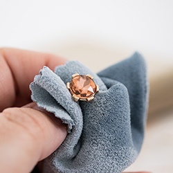 Cleaning cloth with morganite earring