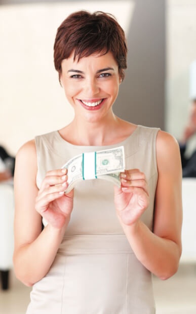Woman holding cash