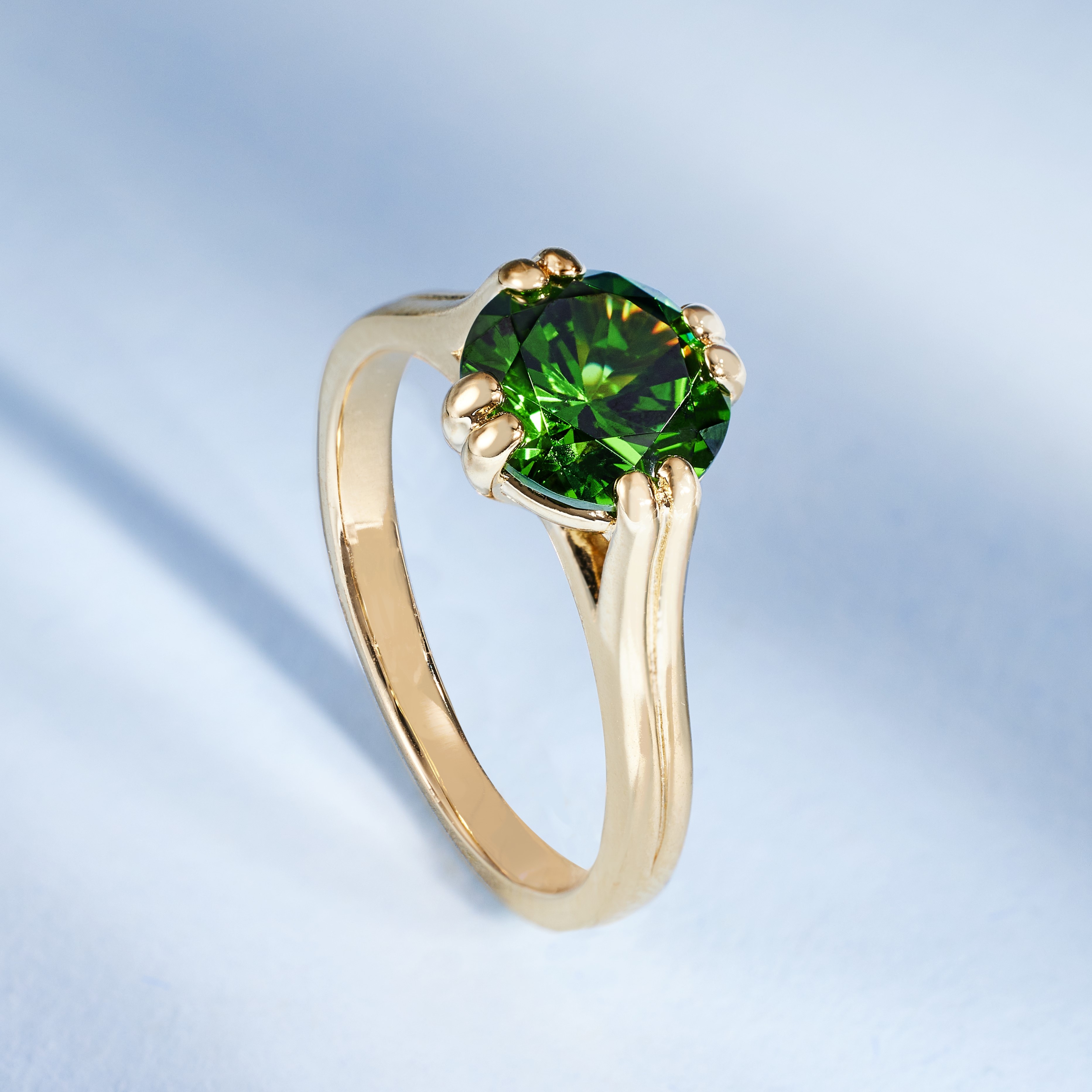 green solitaire ring