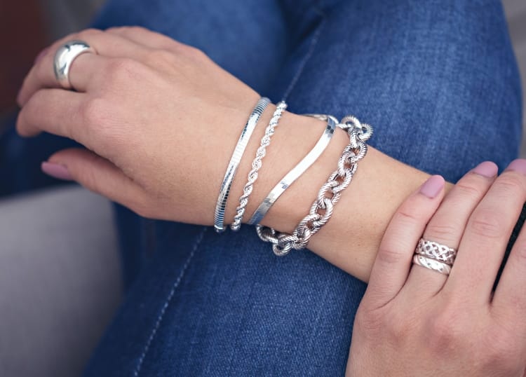 Woman wearing silver bracelets
