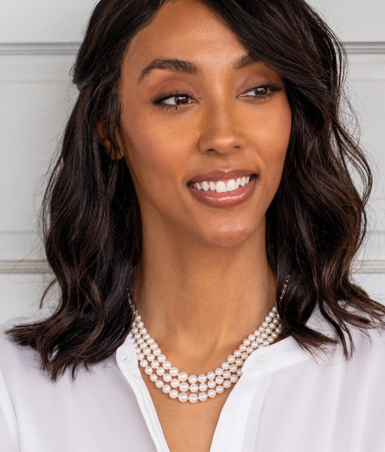 Woman wearing strand necklaces
