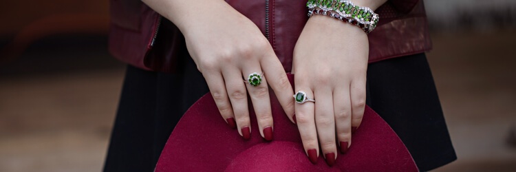 Woman wearing green jewelry